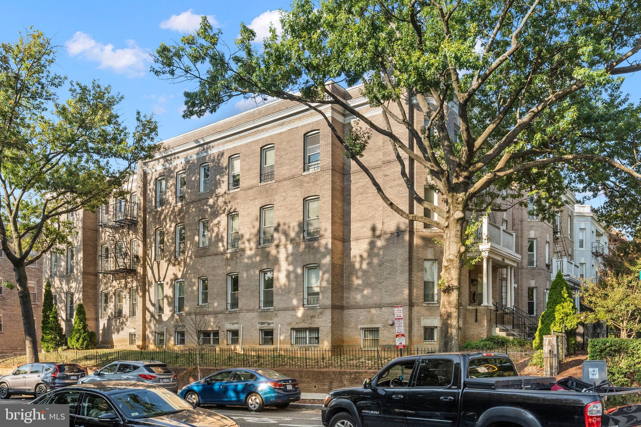 1106 Columbia Road Northwest, Unit 304 Washington, DC 20009 - Photo 23 of 25 a car parked in front of a building