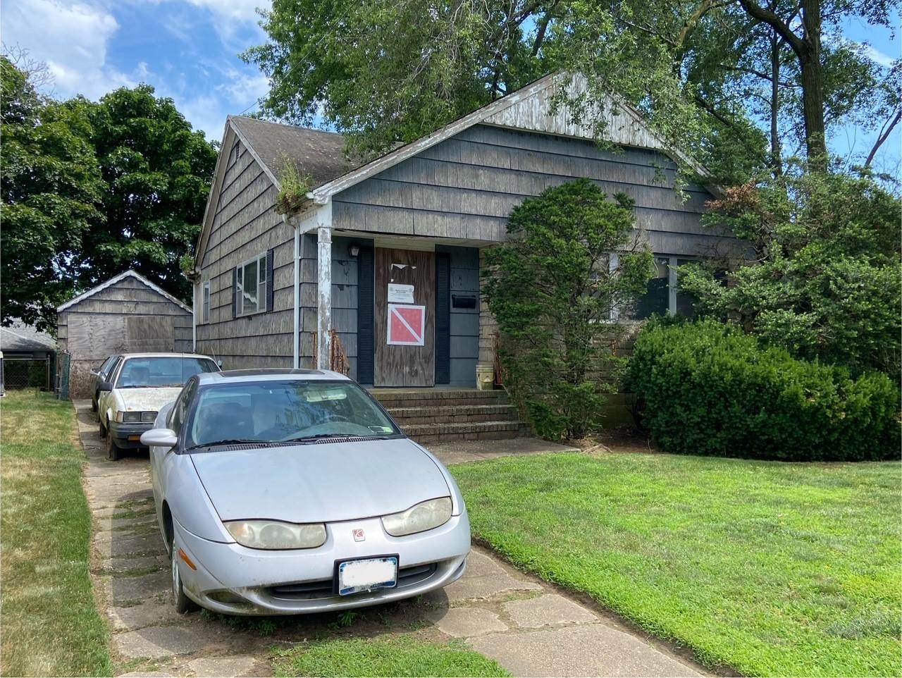a house view with a garden space