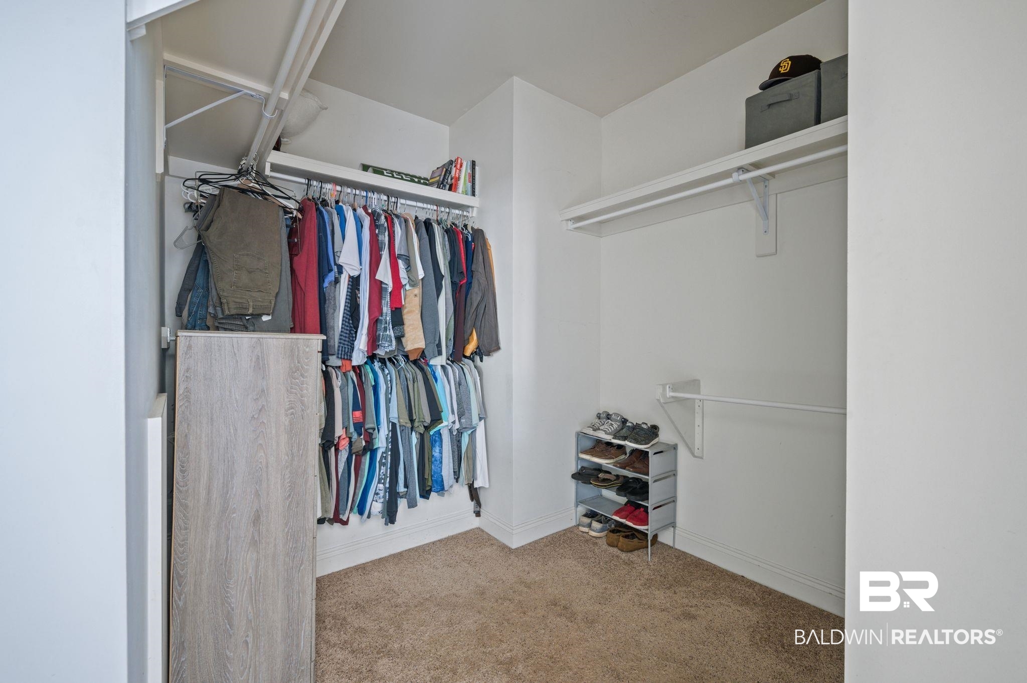 3879 Symphony Way West Semmes, AL 36575 - Photo 20 of 34 Walk in closet with light carpet