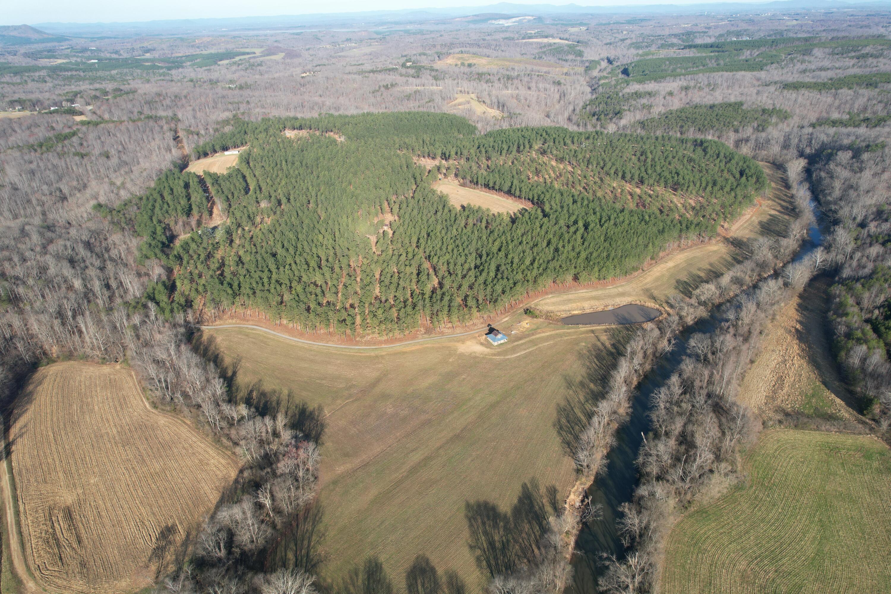 780 Adkins Road Penhook, VA 24137 - Photo 20 of 49 a view of a lake with a mountain