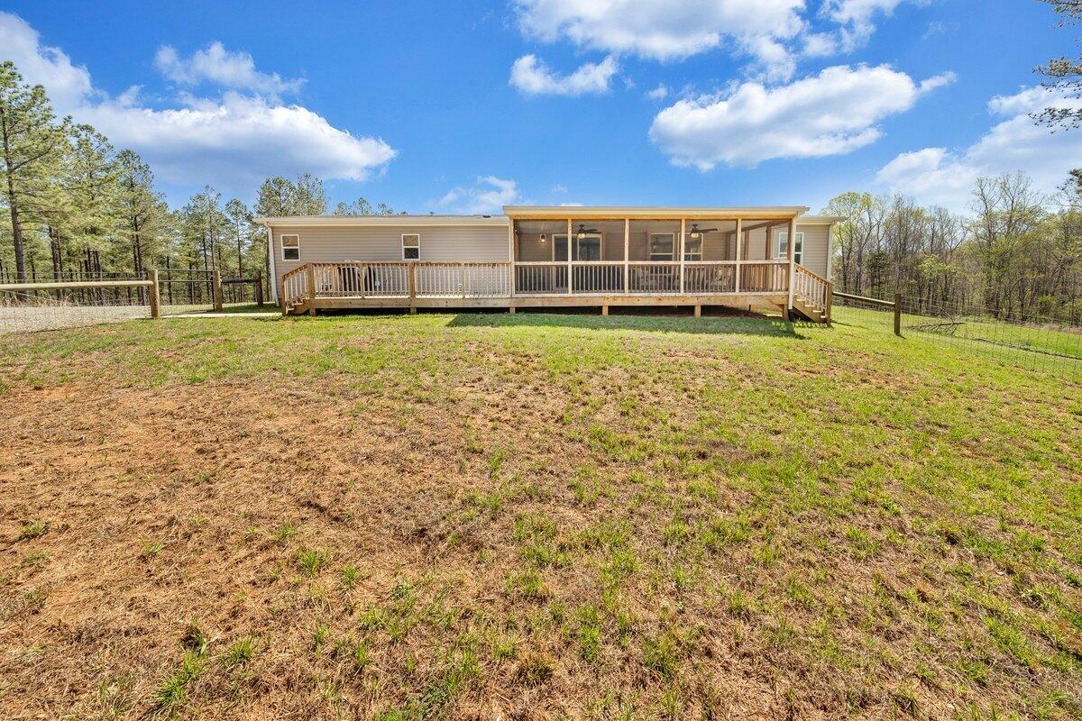 780 Adkins Road Penhook, VA 24137 - Photo 22 of 49 a view of a house with a yard