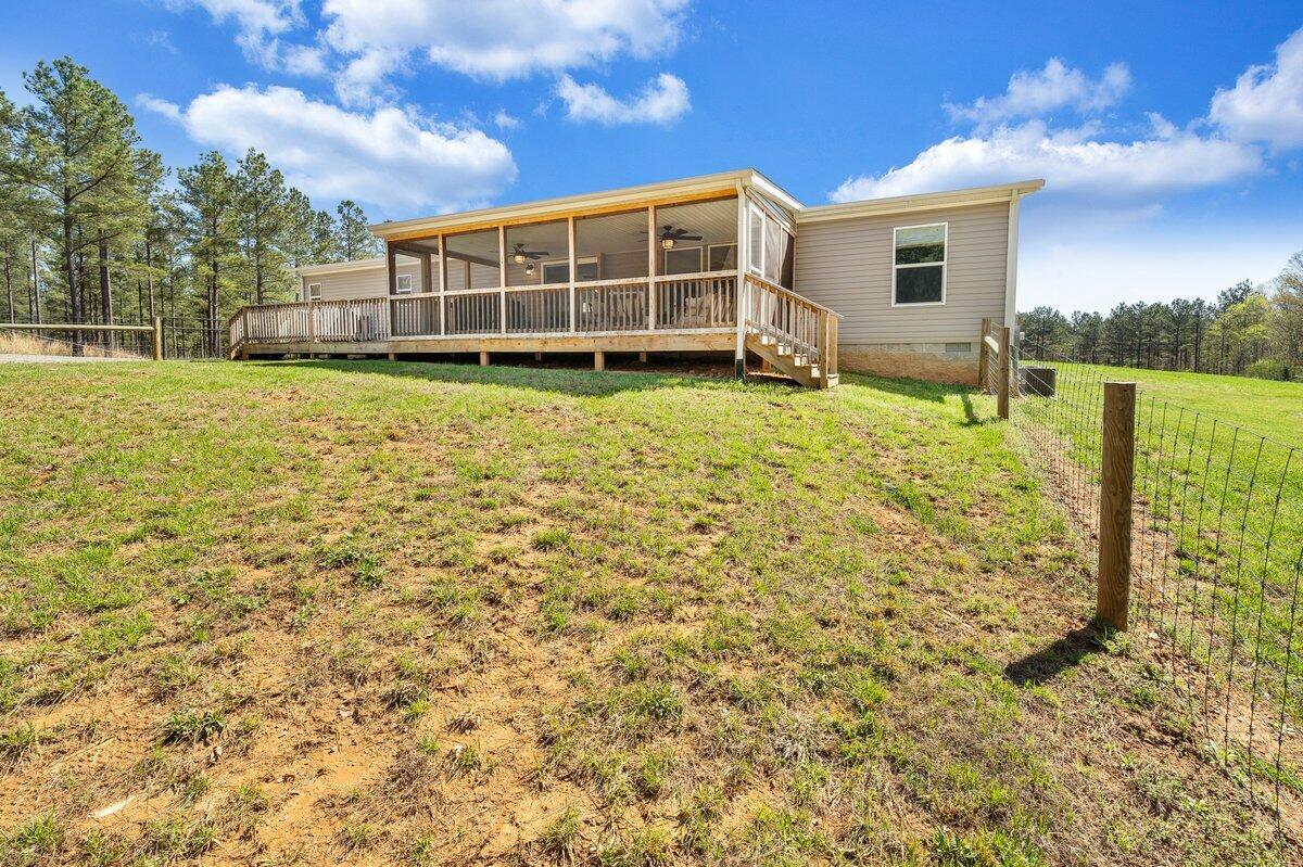 780 Adkins Road Penhook, VA 24137 - Photo 23 of 49 a view of a house with a yard