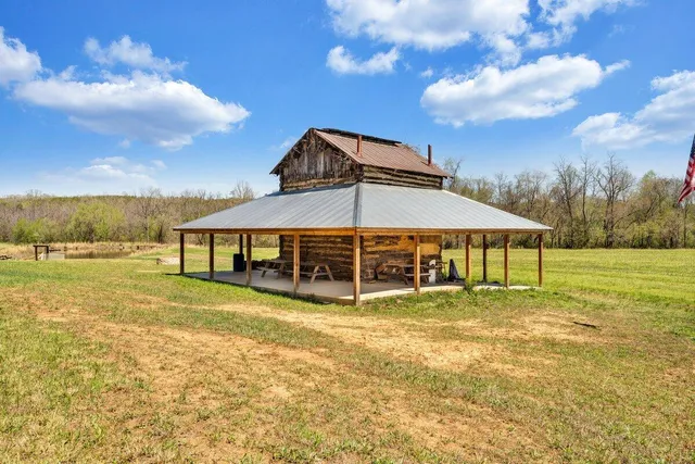 a kitchen with a sink and a refrigerator