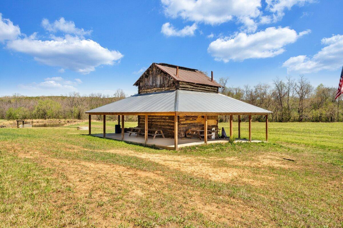 780 Adkins Road Penhook, VA 24137 - Photo 34 of 49 a view of a house with a yard and sitting area