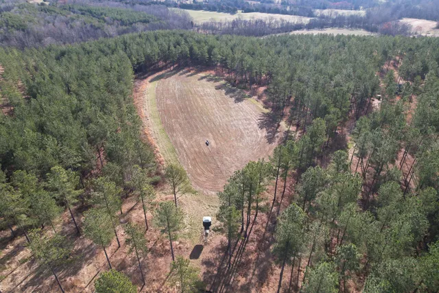 a view of a lake with a yard