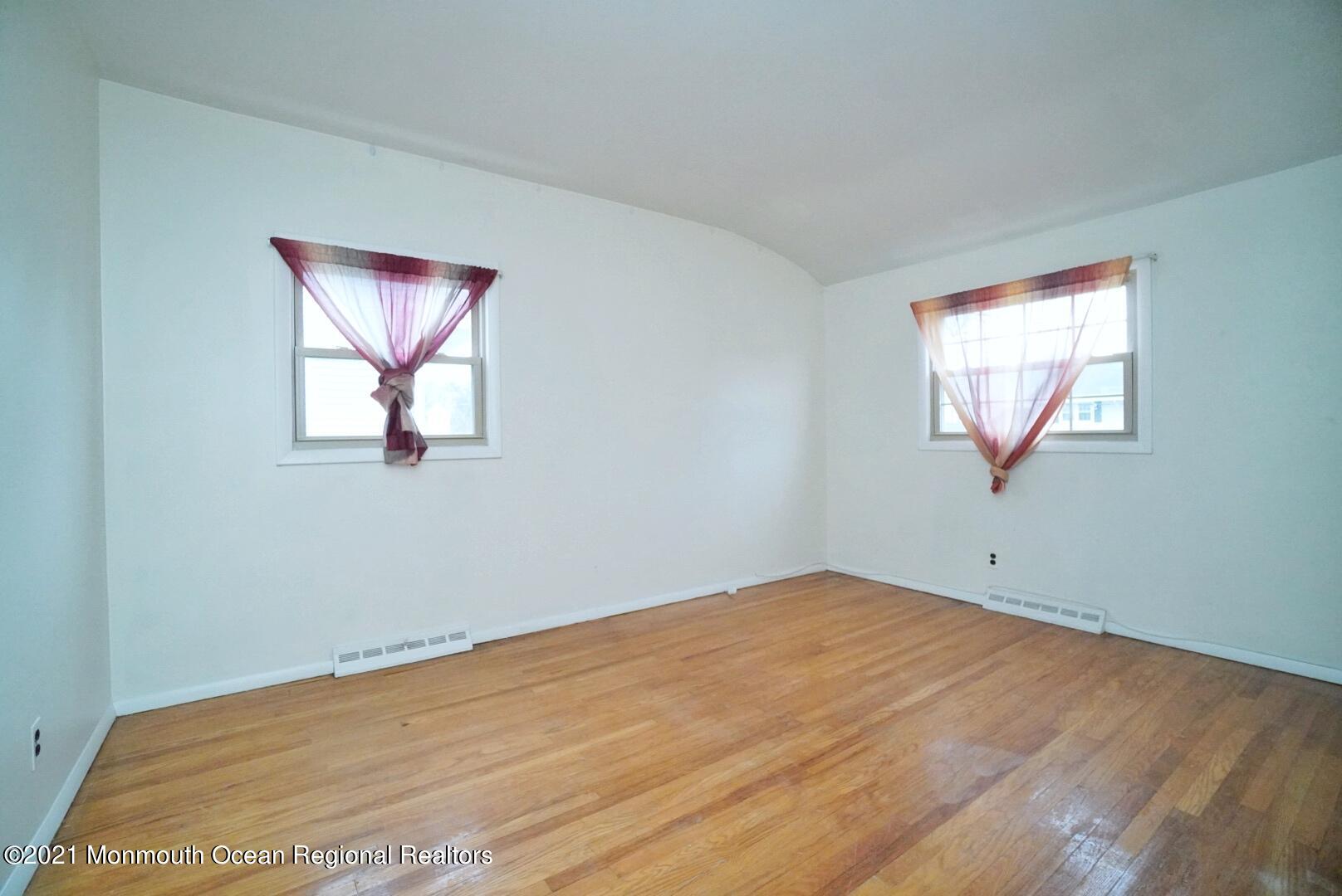 112 Acorn Lane Voorhees, NJ 08043 - Photo 23 of 42 a view of empty room with wooden floor