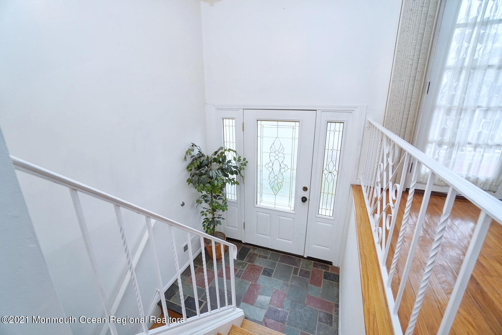 112 Acorn Lane Voorhees, NJ 08043 - Photo 6 of 42 a view of an entryway with wooden floor