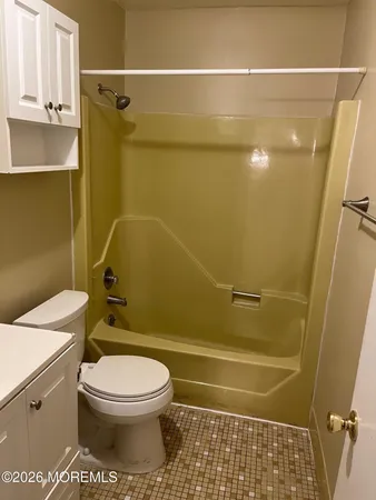 a view of a room with a large window