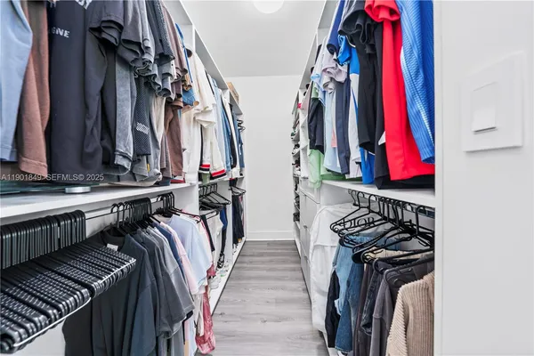 a bathroom with a bathtub and a sink