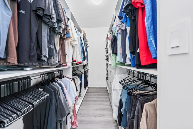 a bathroom with a bathtub and a sink