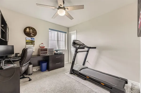 a view of a workspace with gym equipment