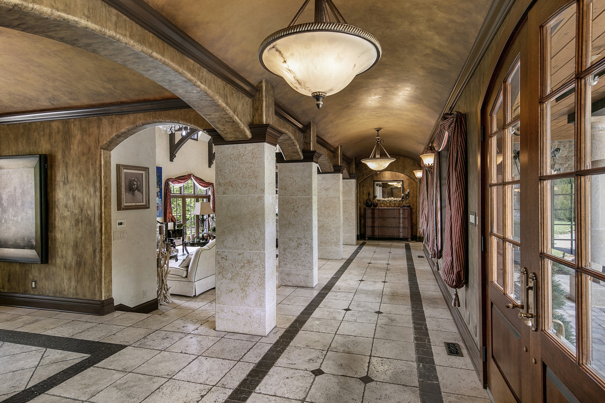 255 Villa Segrata North Ridge Road Sevierville, TN 37876 - Photo 17 of 78 a view of a hallway with wooden floor and a fireplace