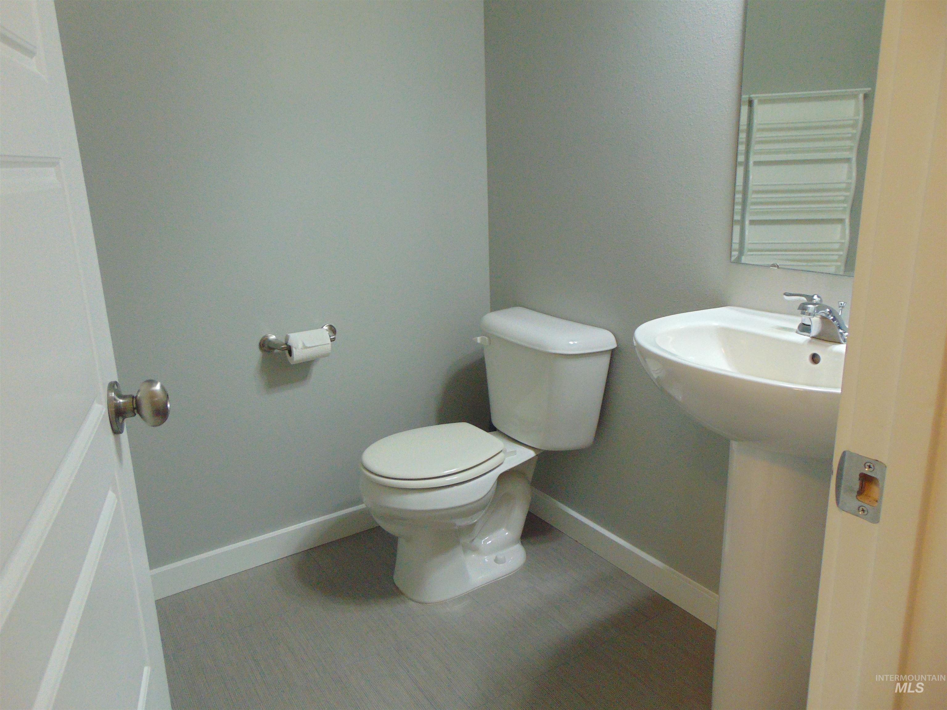 983 South Street Vale, OR 97918 - Photo 18 of 36 Half bath with radiator and a towel warming rack