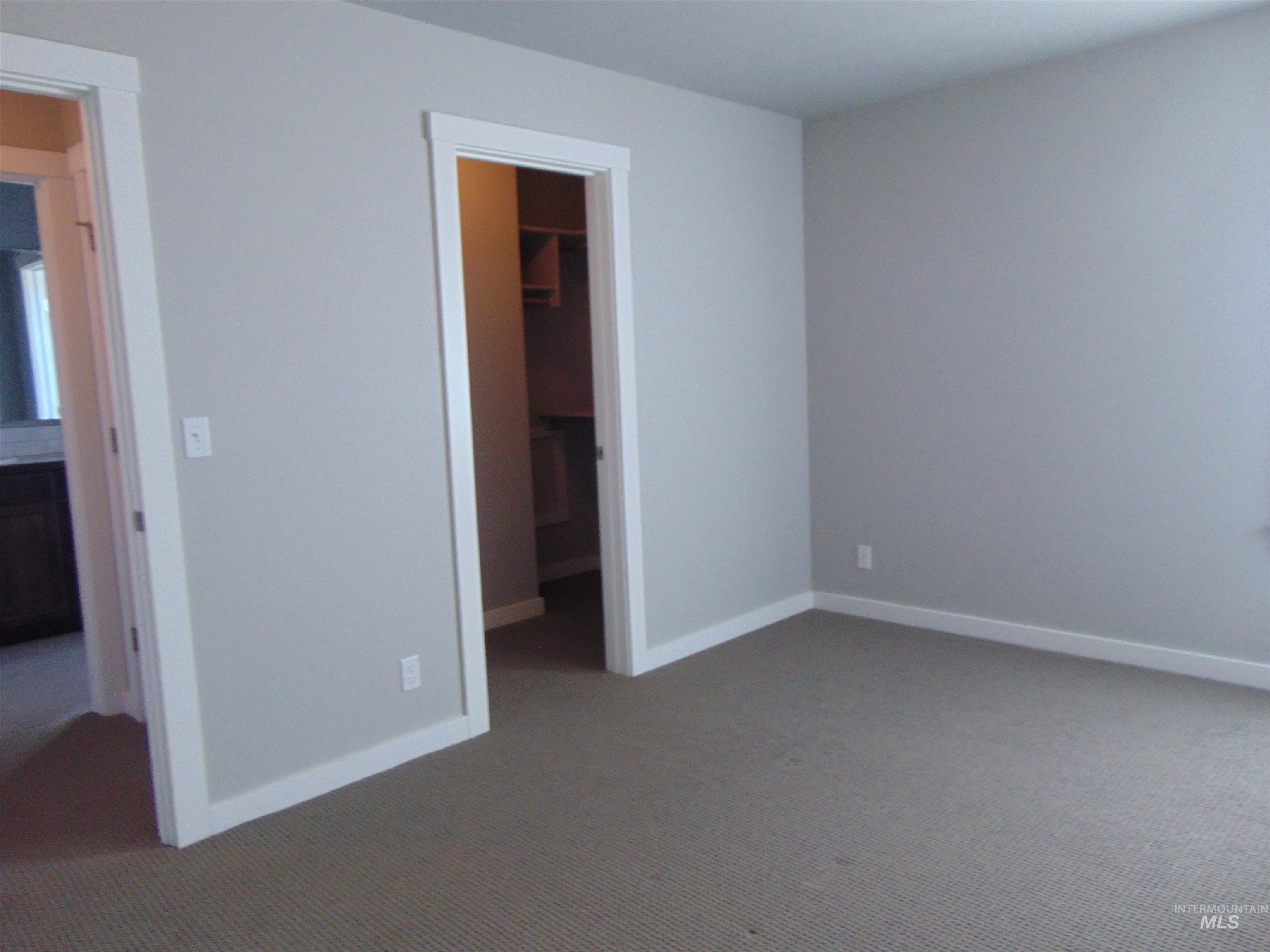 983 South Street Vale, OR 97918 - Photo 25 of 36 Unfurnished bedroom featuring carpet floors and a spacious closet