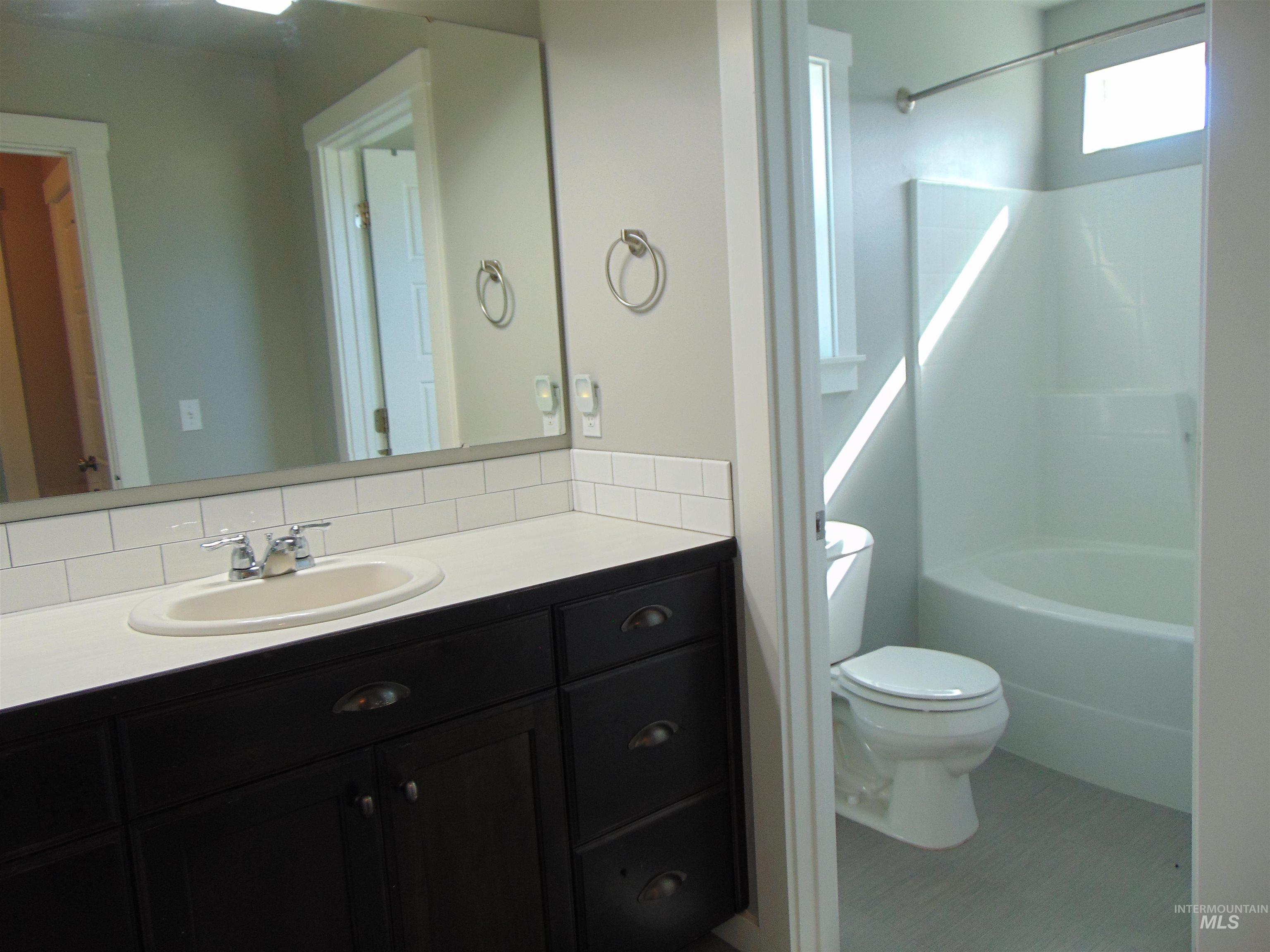983 South Street Vale, OR 97918 - Photo 27 of 36 Bathroom featuring vanity and shower / bathtub combination
