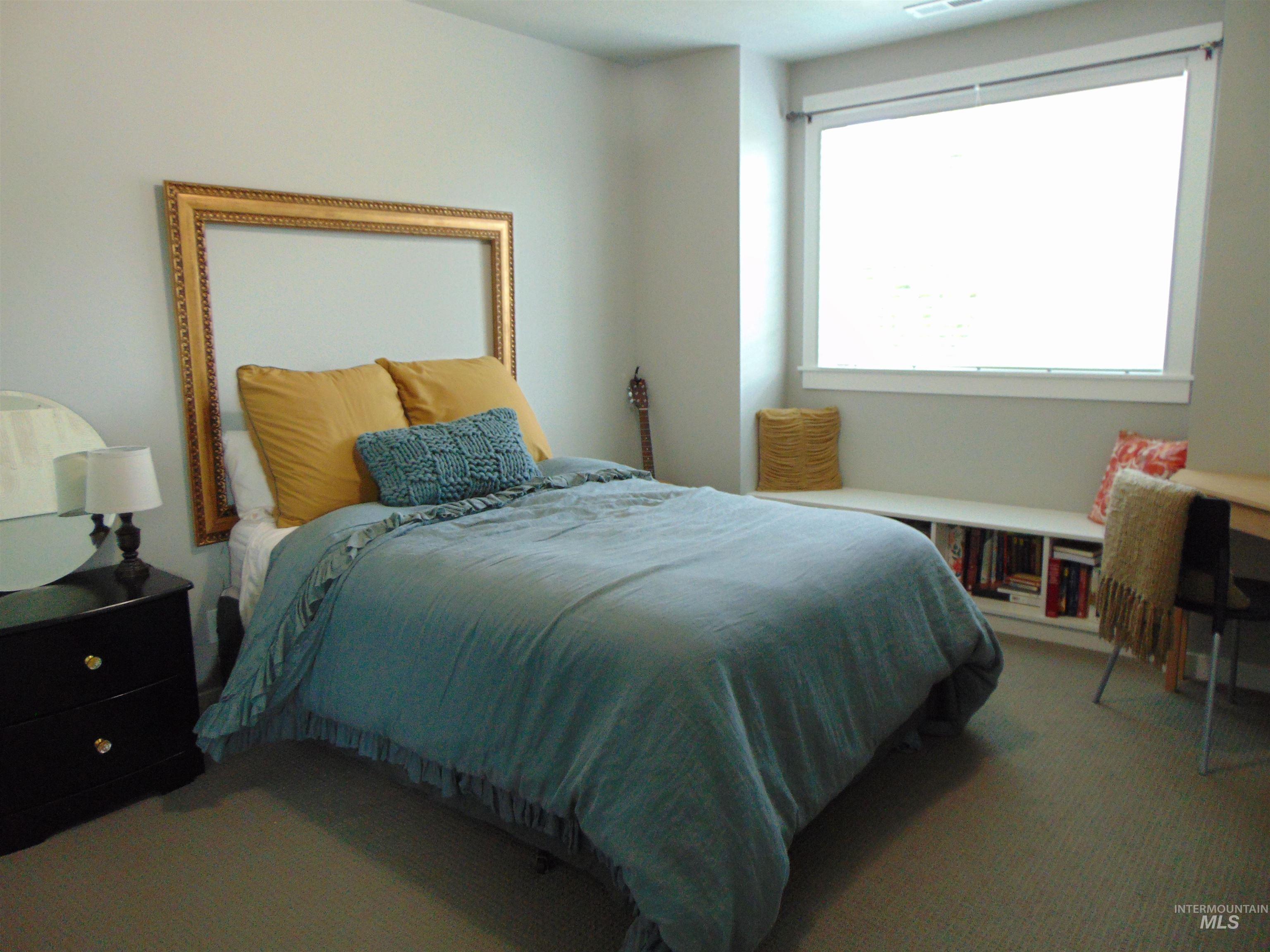 983 South Street Vale, OR 97918 - Photo 28 of 36 Bedroom featuring light carpet