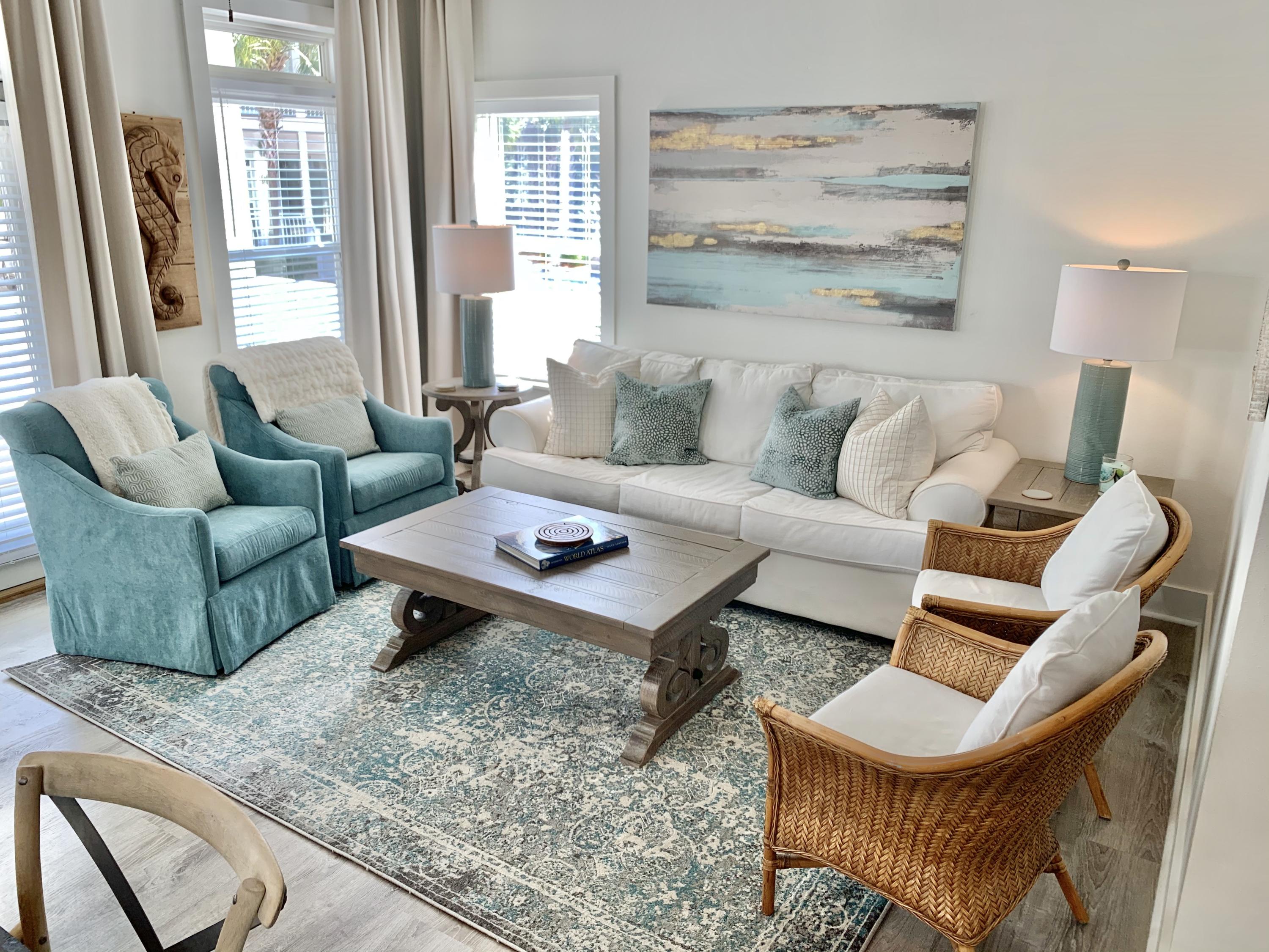 60 The Greenway Loop Inlet Beach, FL 32461 - Photo 11 of 35 a living room with furniture a rug and a large window