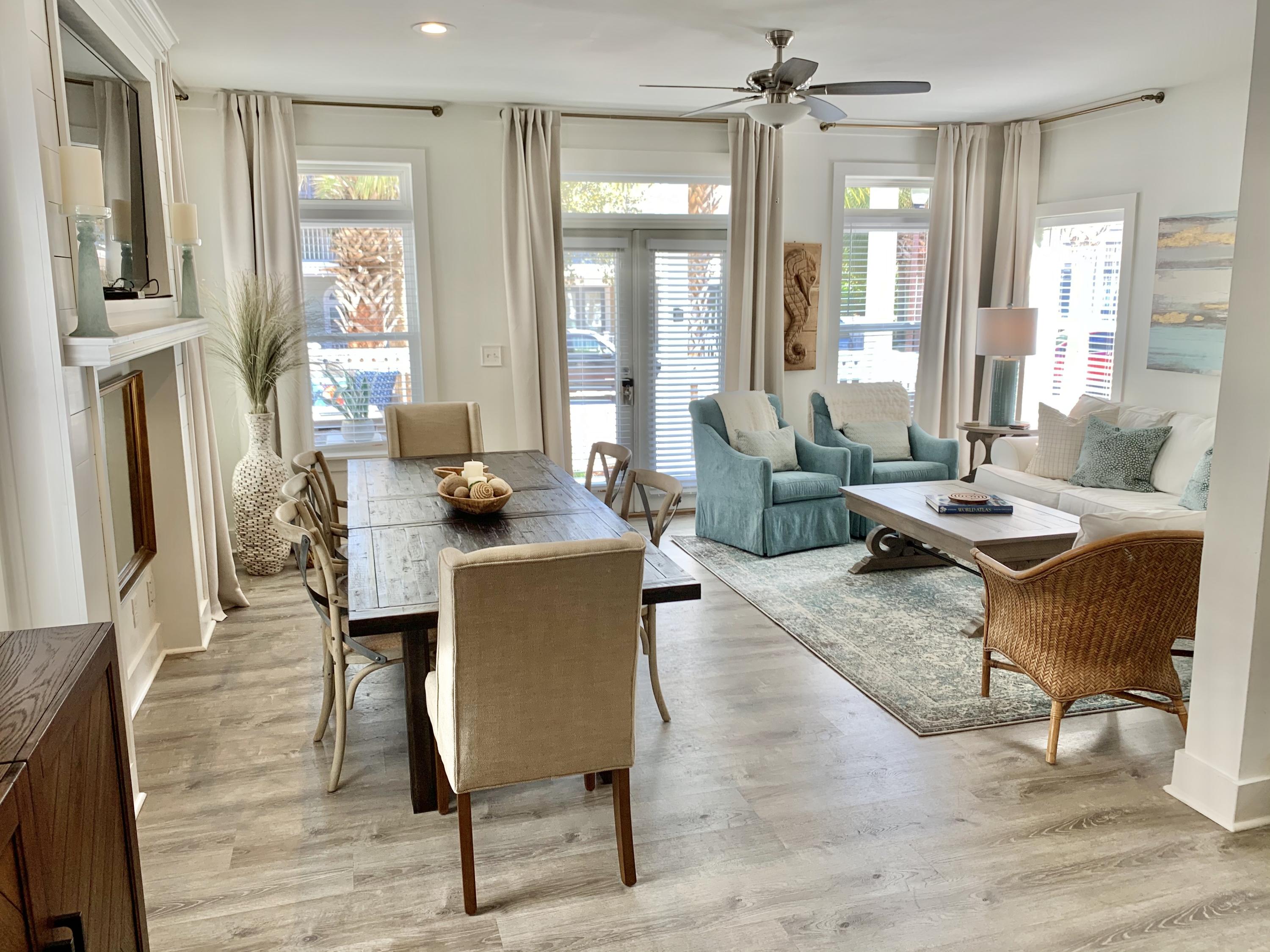 60 The Greenway Loop Inlet Beach, FL 32461 - Photo 22 of 35 a living room with furniture and large windows