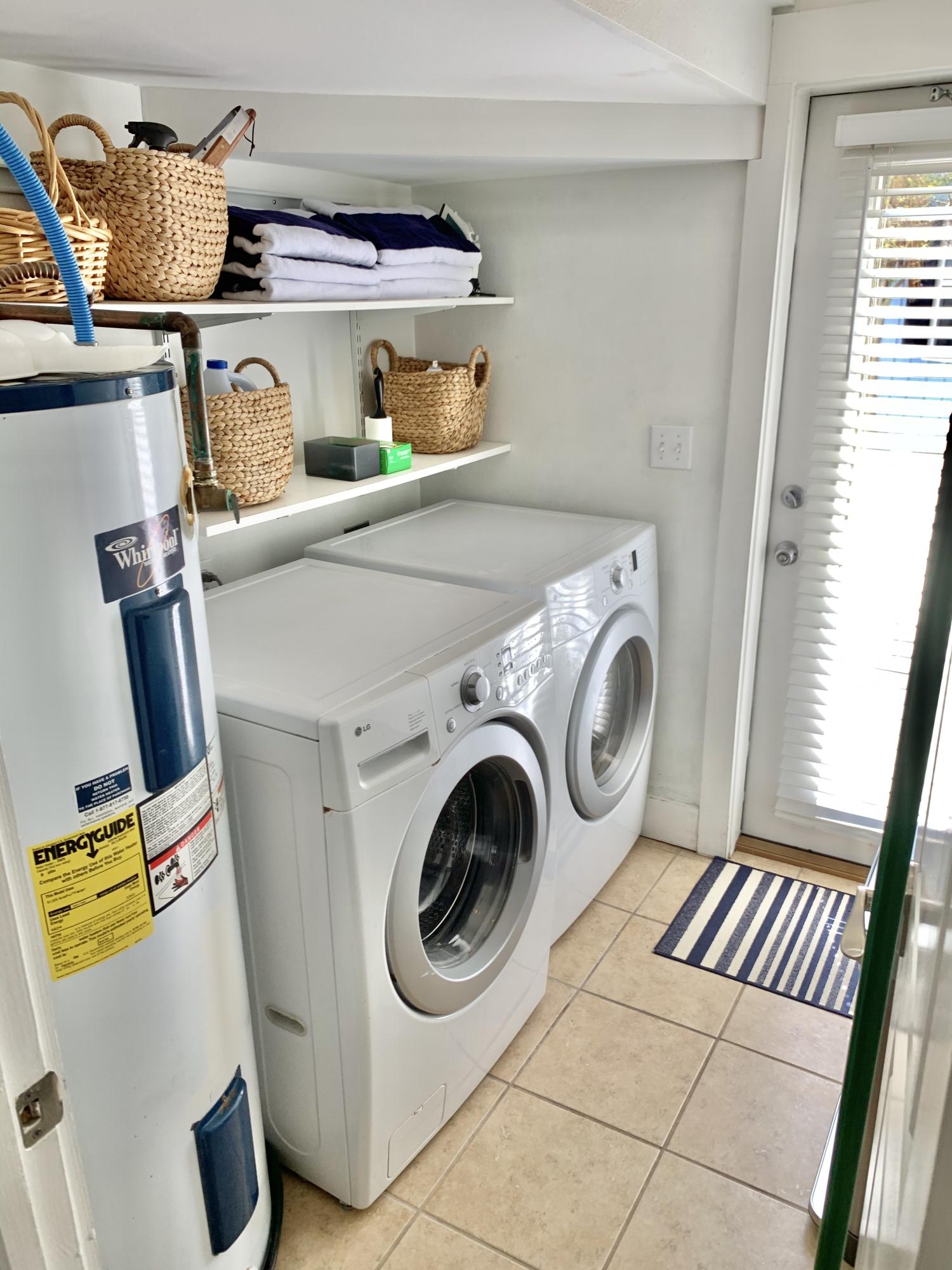 60 The Greenway Loop Inlet Beach, FL 32461 - Photo 23 of 35 a utility room with dryer and washer
