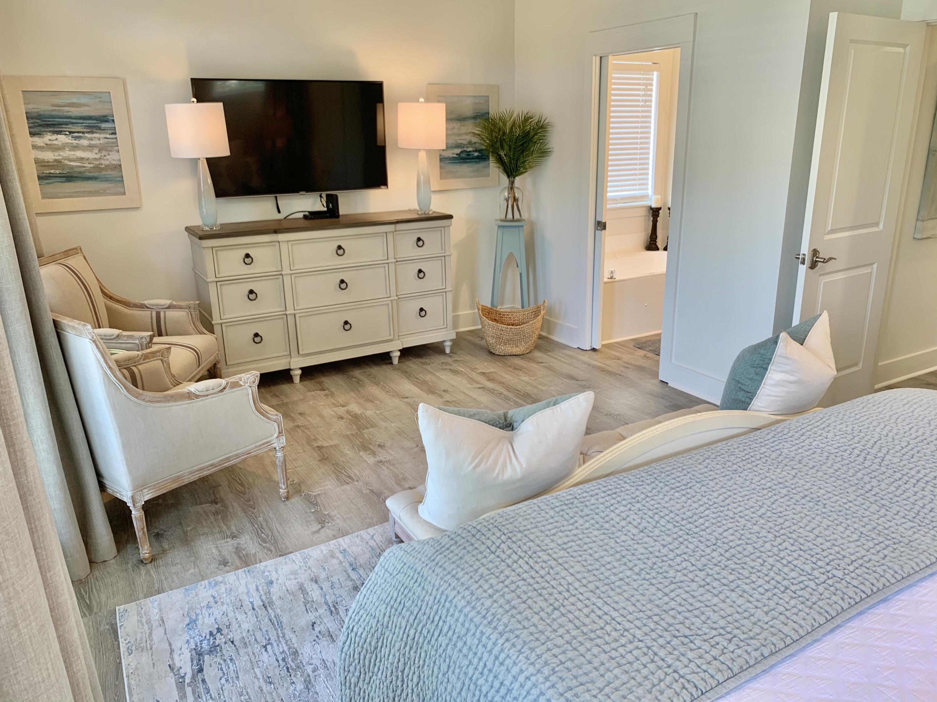 60 The Greenway Loop Inlet Beach, FL 32461 - Photo 27 of 35 a living room with furniture and a flat screen tv