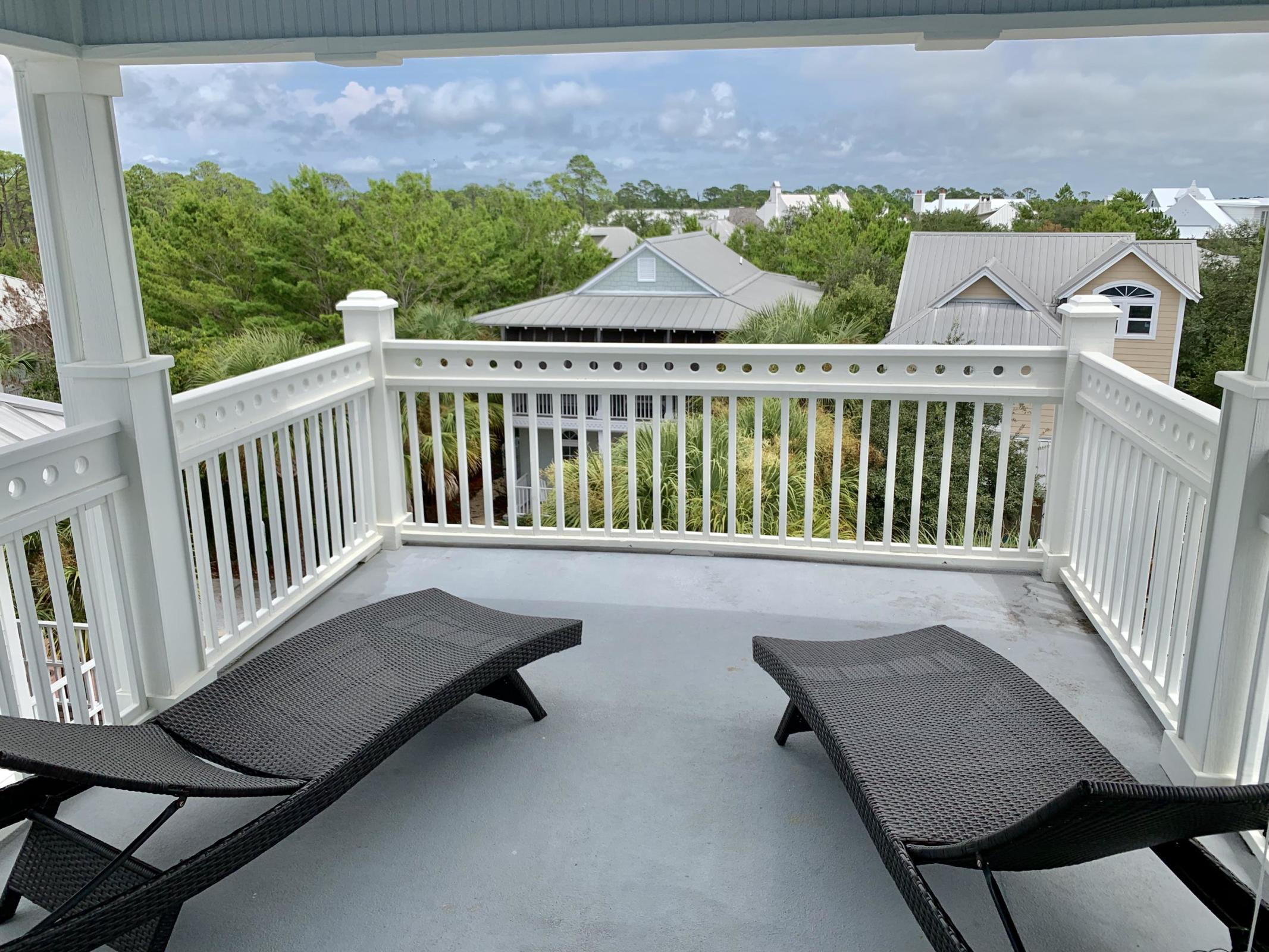 60 The Greenway Loop Inlet Beach, FL 32461 - Photo 29 of 35 a view of a patio with a table