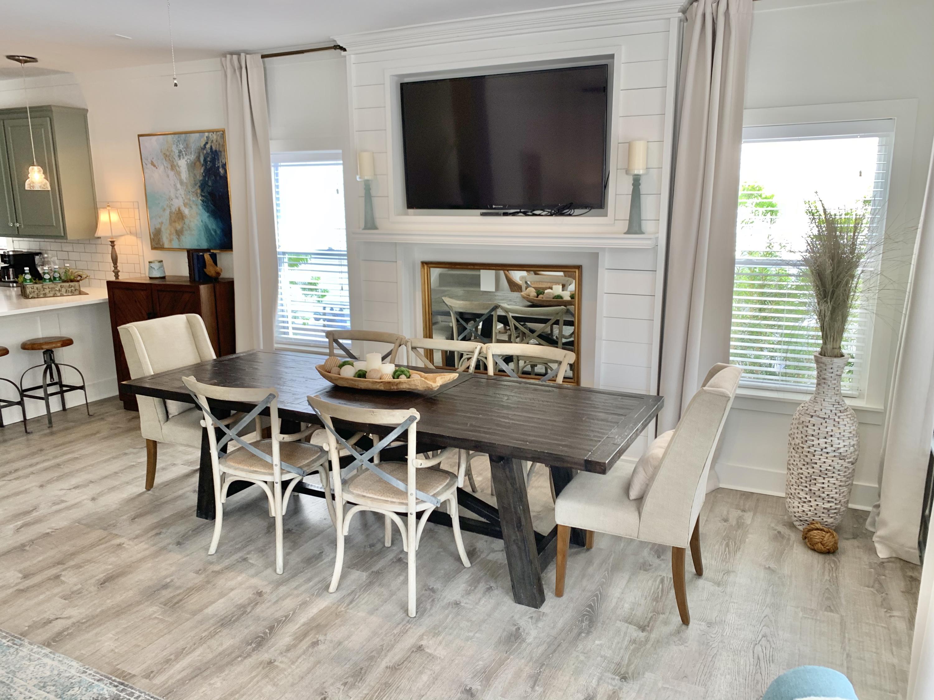 60 The Greenway Loop Inlet Beach, FL 32461 - Photo 5 of 35 a dining room with furniture and wooden floor