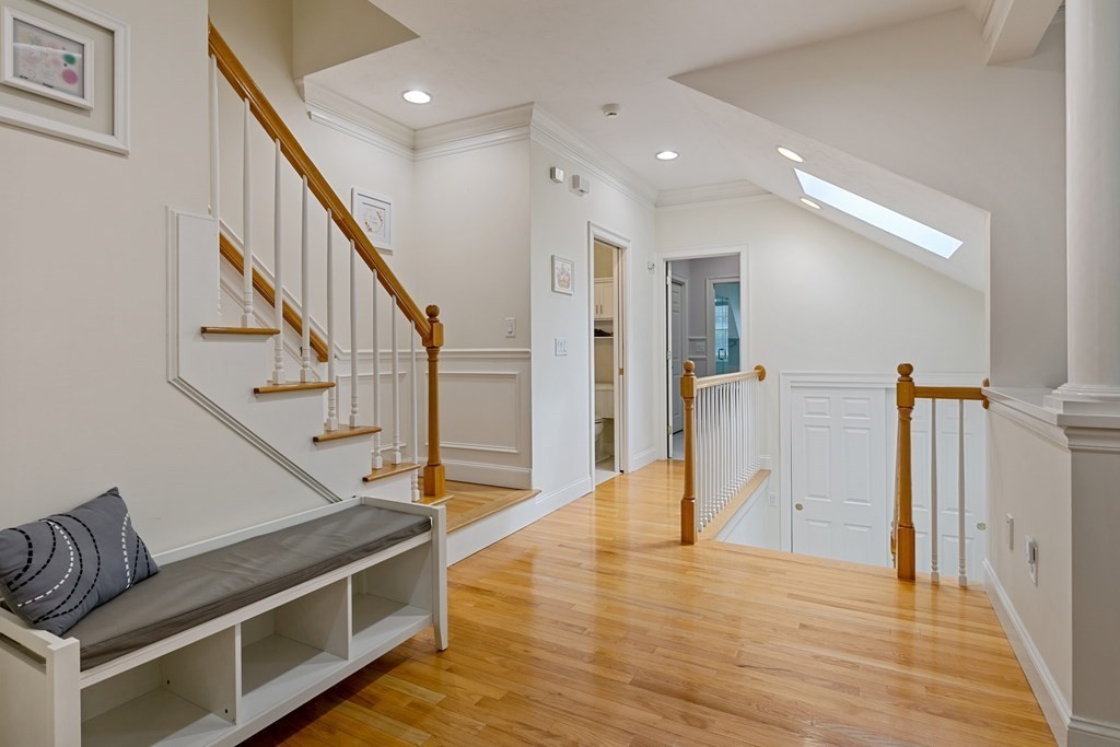 9 Chestnut Lane, Unit 9 Lexington, MA 02421 - Photo 19 of 32 a view of livingroom with furniture and stairs