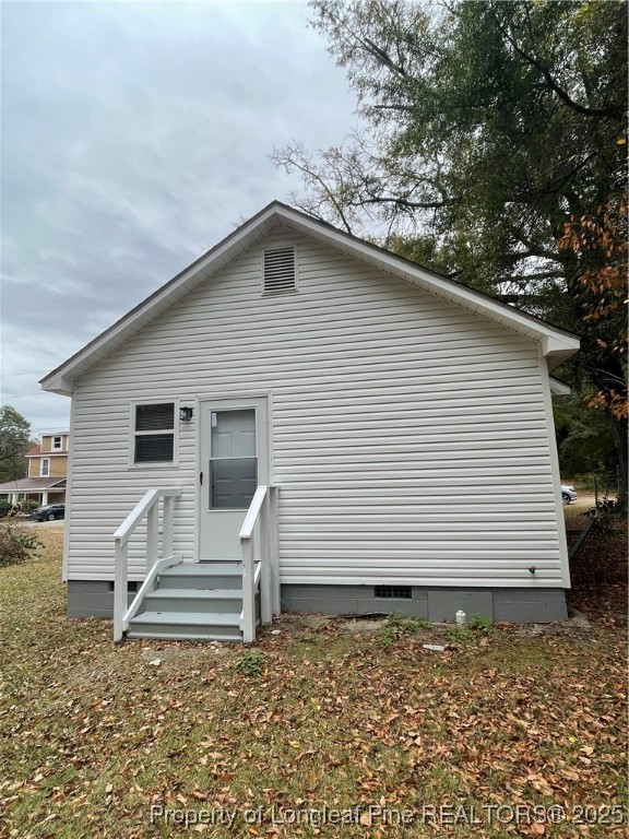 1106 Simpson Street Fayetteville, NC 28305 - Photo 2 of 14 a view of a house with a yard