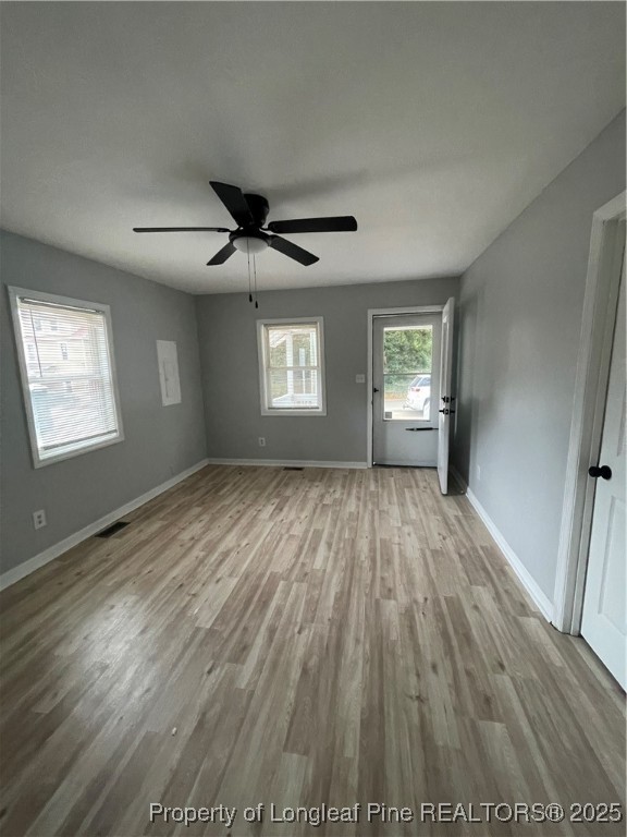 1106 Simpson Street Fayetteville, NC 28305 - Photo 5 of 14 a view of an empty room and window