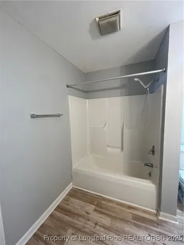 a bathroom with a sink a mirror and vanity