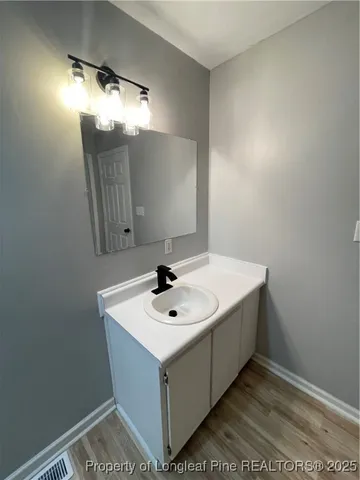 a view of a kitchen with a sink