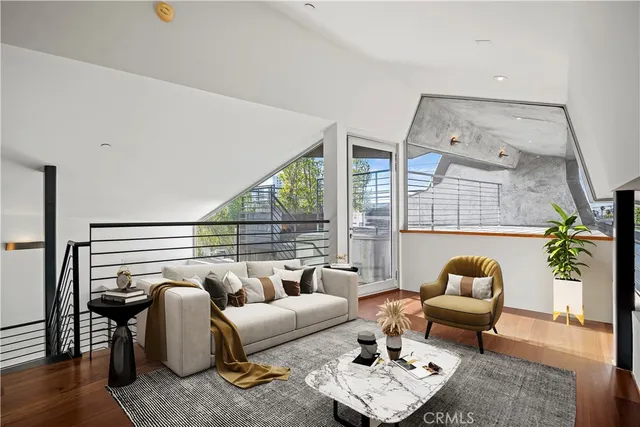 a view of an empty room with a staircase