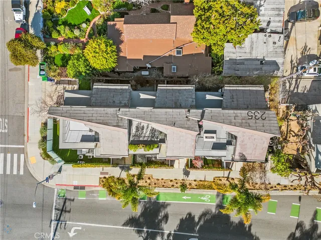 an aerial view of a building with outdoor space