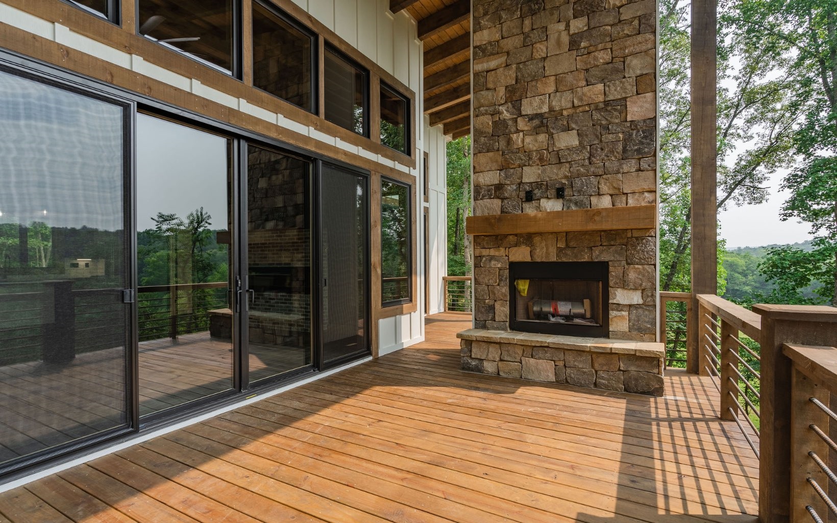 140 Watkins Farm Road Blue Ridge, GA 30513 - Photo 6 of 63 a building with glass windows