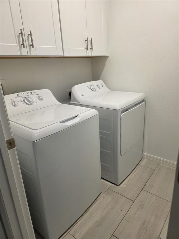 12588 Timber Moss Lane Riverview, FL 33579 - Photo 8 of 10 a utility room with dryer and washer