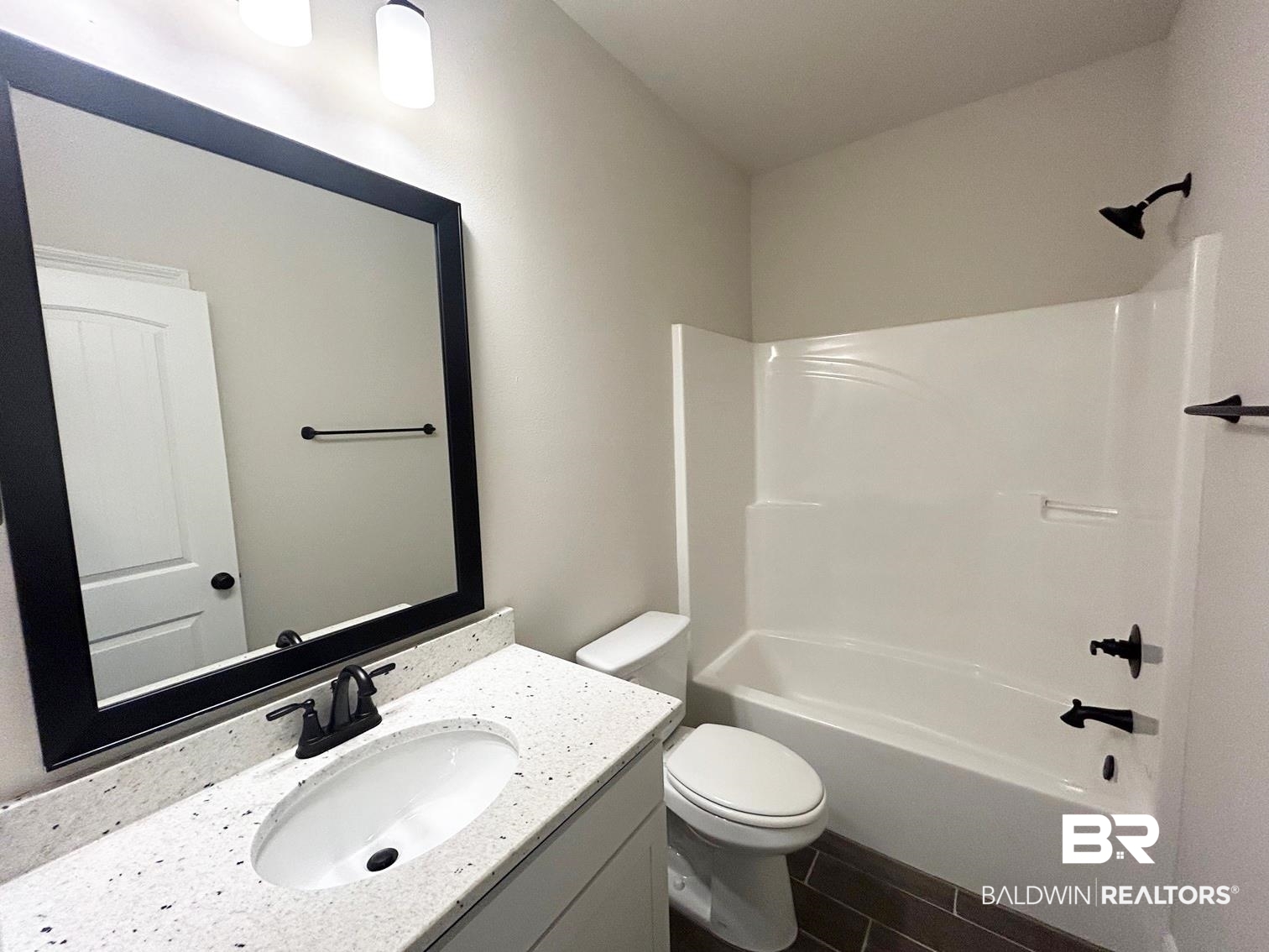 868 Sumter Loop Foley, AL 36535 - Photo 13 of 16 Full bathroom with bathtub / shower combination, vanity, and toilet