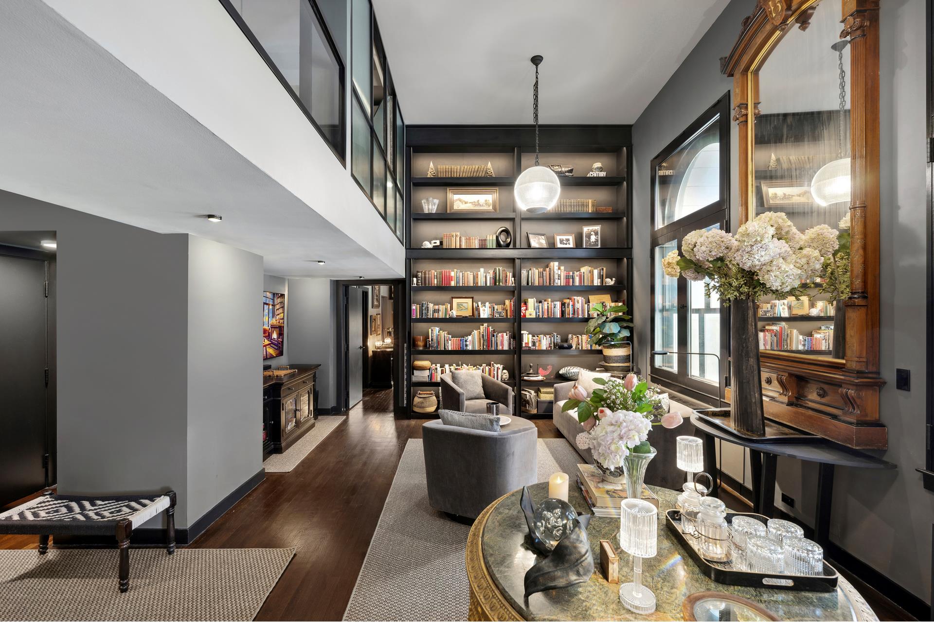 240 Centre Street, Unit 2K Manhattan, NY 10013 - Photo 1 of 10 a view of a entryway with furniture and chandelier