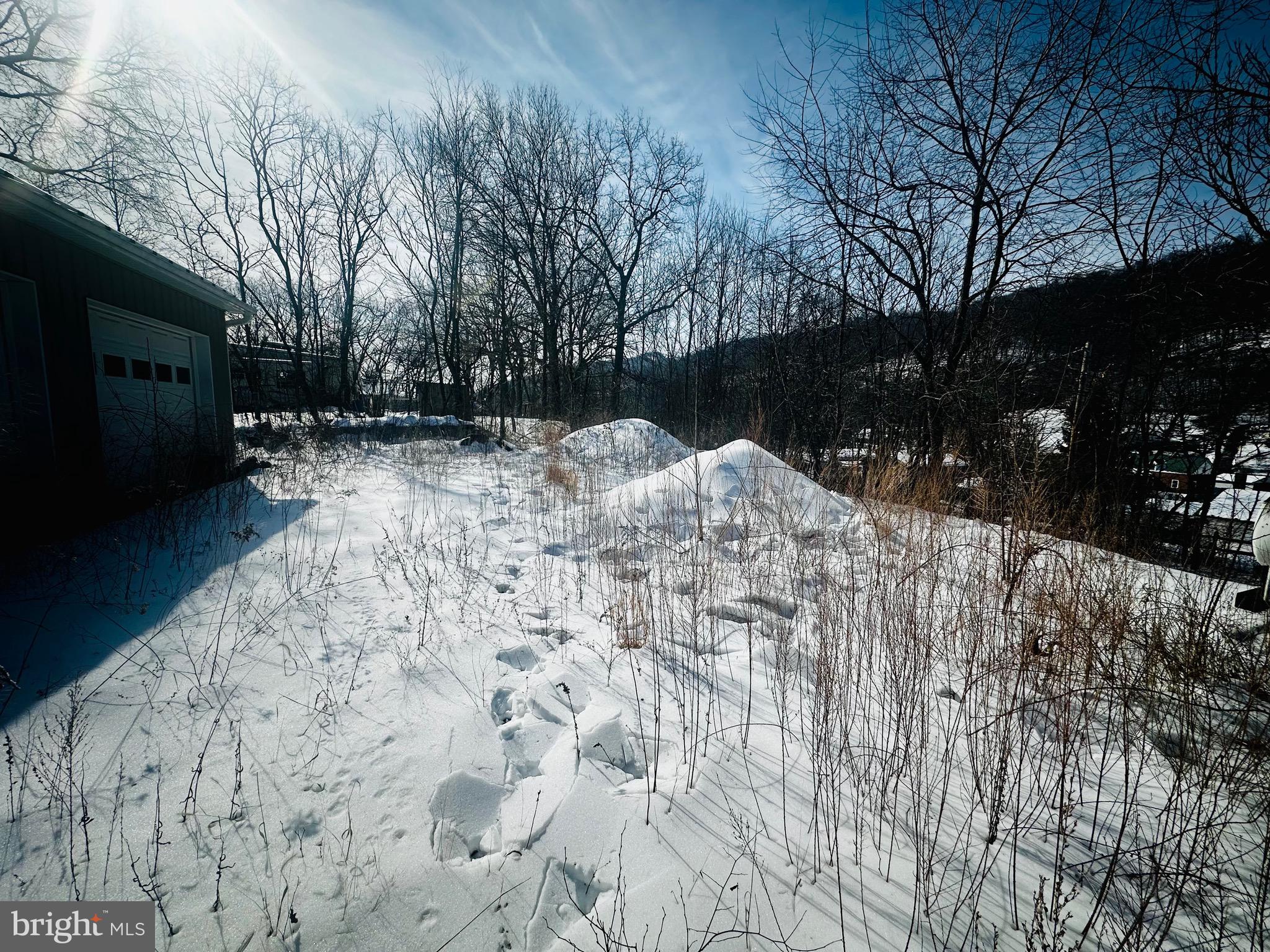 82 Kingbaum Street Ridgeley, WV 26753 - Photo 4 of 13 a view of snow on the side of the road