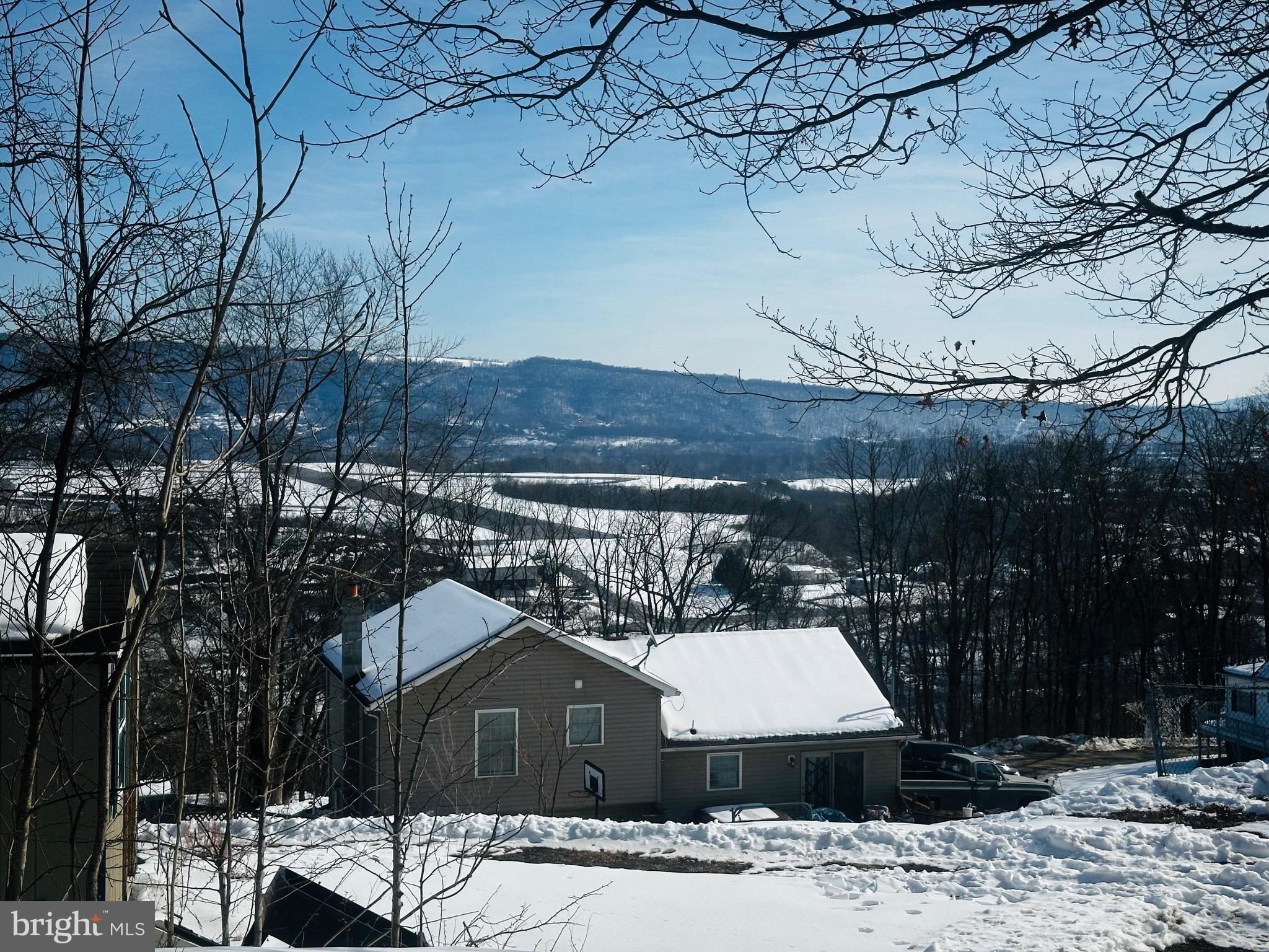 82 Kingbaum Street Ridgeley, WV 26753 - Photo 8 of 13 a view of a house with a yard
