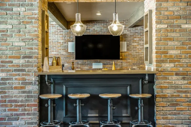 a kitchen with a table and chairs