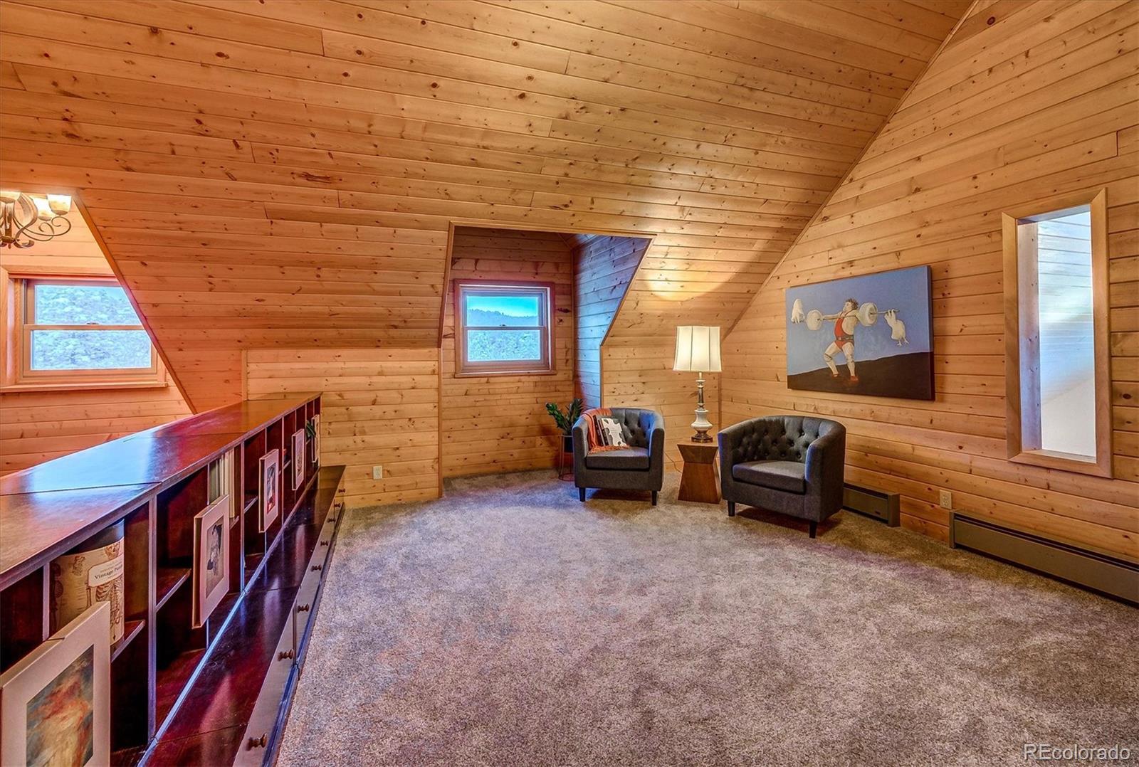 9055 Eagle Cliff Road Conifer, CO 80433 - Photo 19 of 39 a view of front door with outdoor space