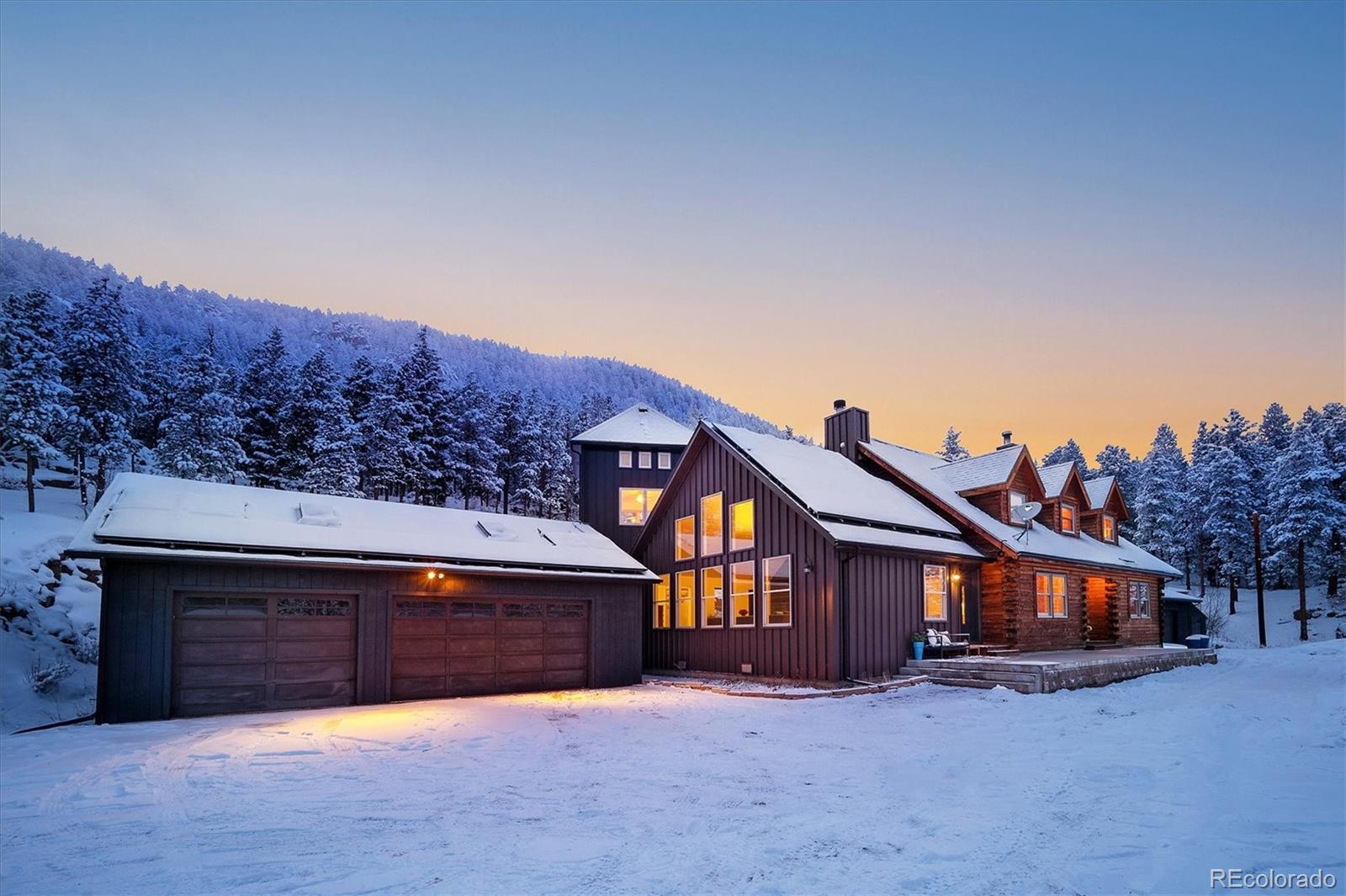 9055 Eagle Cliff Road Conifer, CO 80433 - Photo 2 of 39 a view of a house with a big yard and large tree