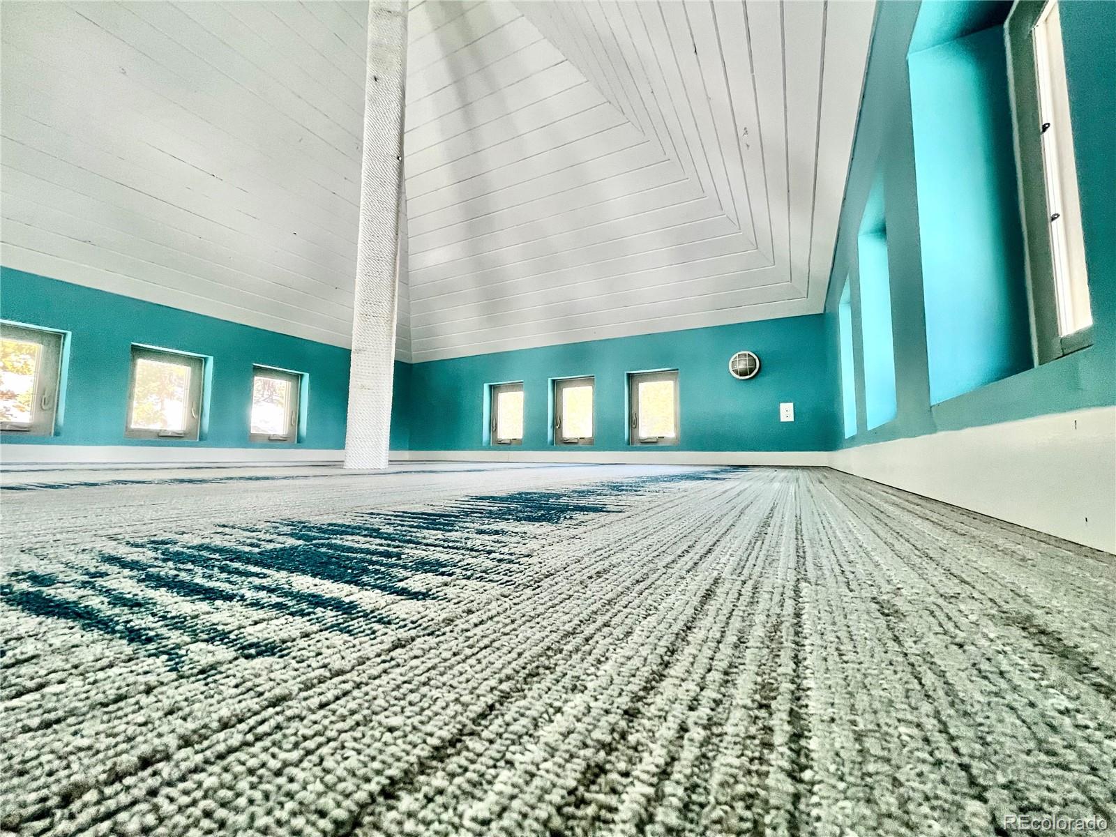 9055 Eagle Cliff Road Conifer, CO 80433 - Photo 27 of 39 a view of an empty room