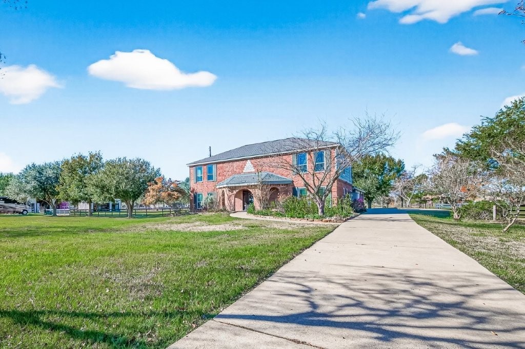6610 Sprigg Street Fulshear, TX 77441 - Photo 2 of 49 a view of a volley ball court