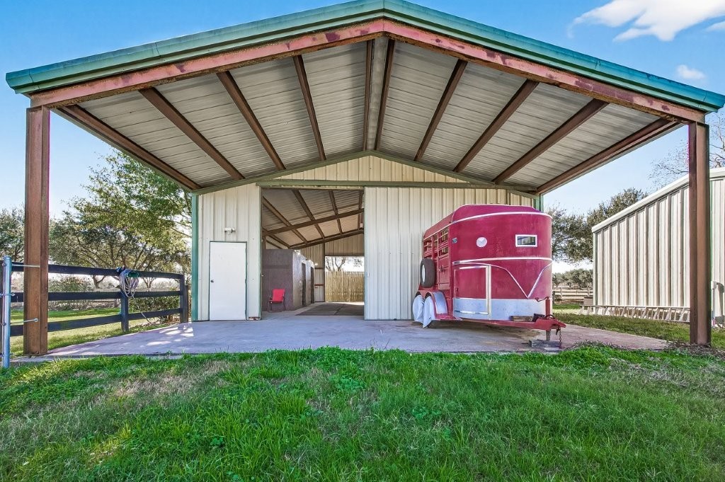 6610 Sprigg Street Fulshear, TX 77441 - Photo 41 of 49 a view of front door with outdoor space