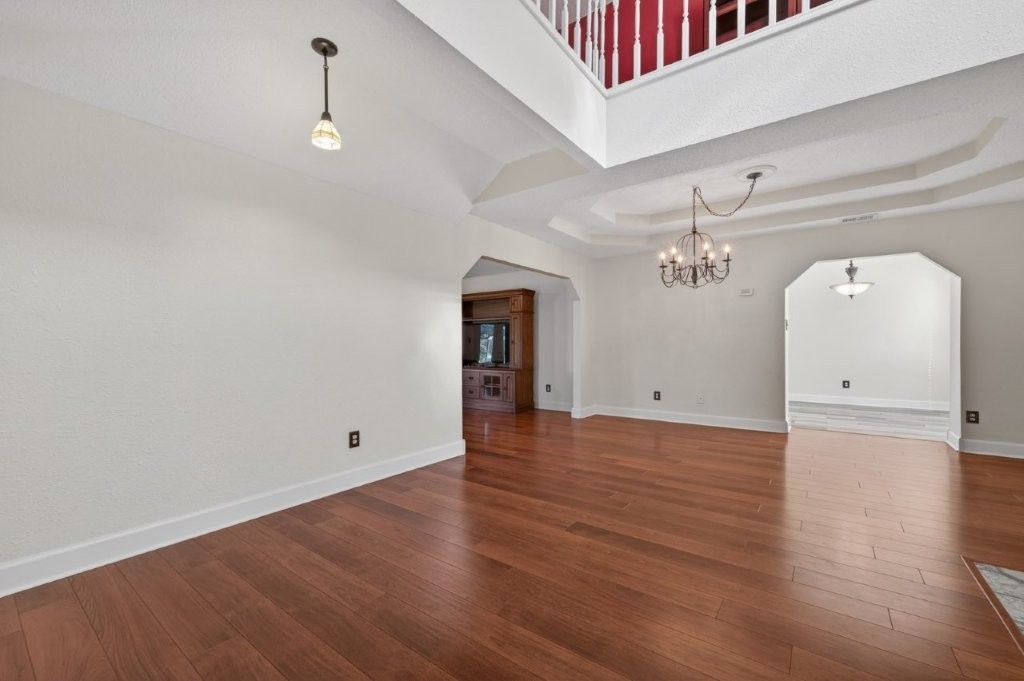 6610 Sprigg Street Fulshear, TX 77441 - Photo 9 of 49 a view of a room with wooden floors