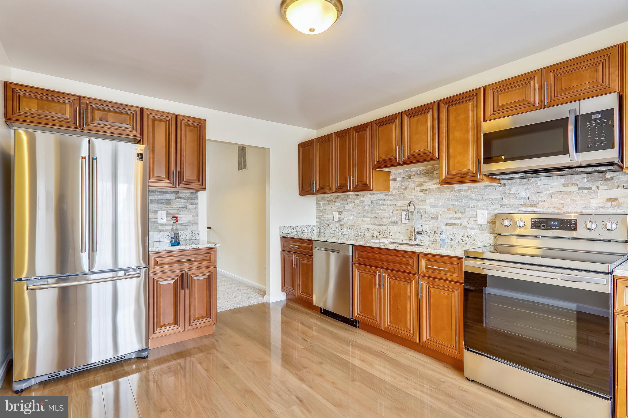 10600 Georgia Avenue Silver Spring, MD 20902 - Photo 2 of 44 Main level table-space kitchen