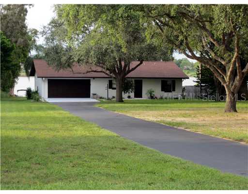 1310 Lucerne Loop Road Northeast Winter Haven, FL 33881 - Photo 1 of 1 Exterior Front