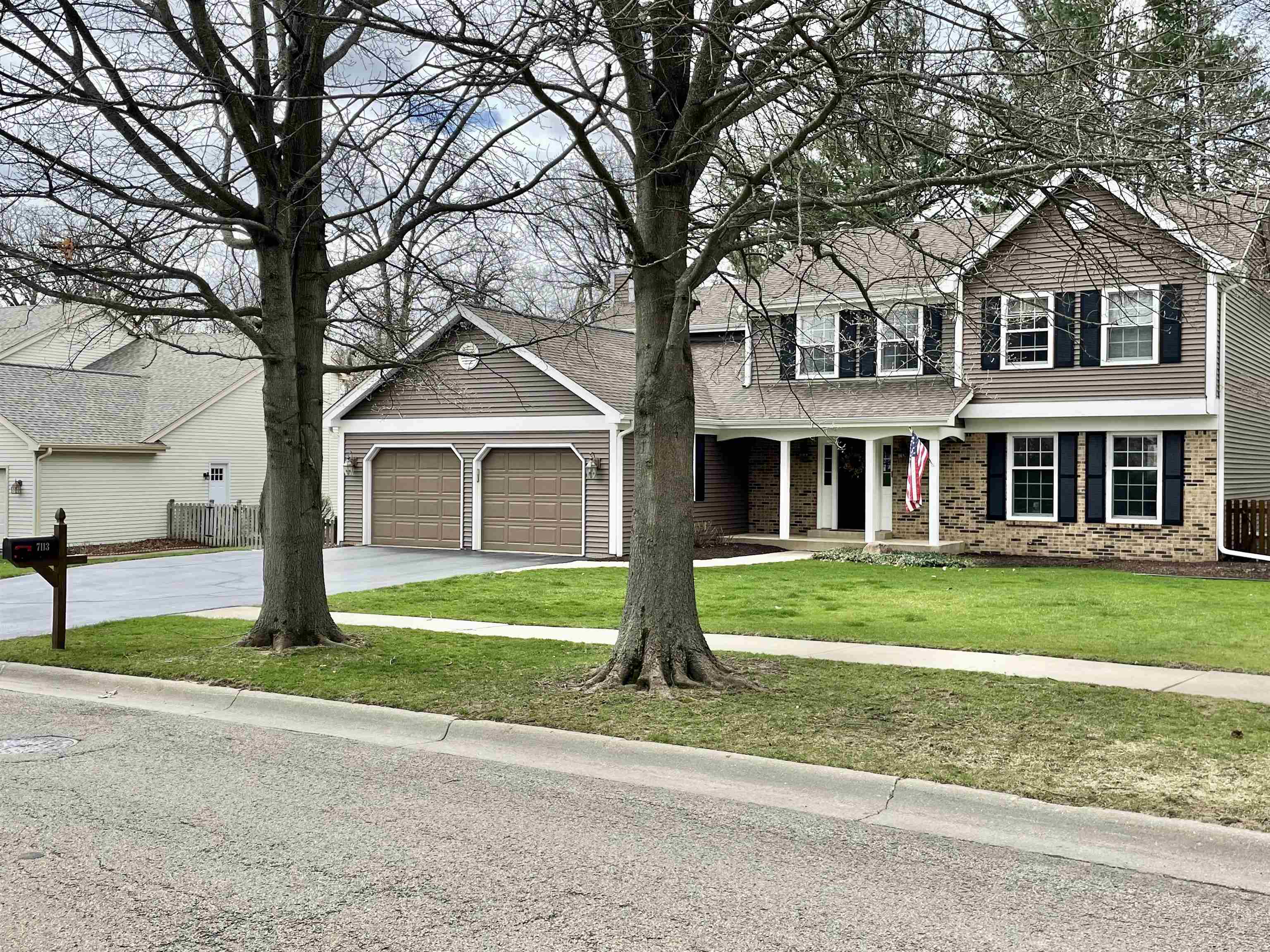 7113 Sentinel Road Rockford, IL 61107 - Photo 1 of 38 a front view of a house with a yard