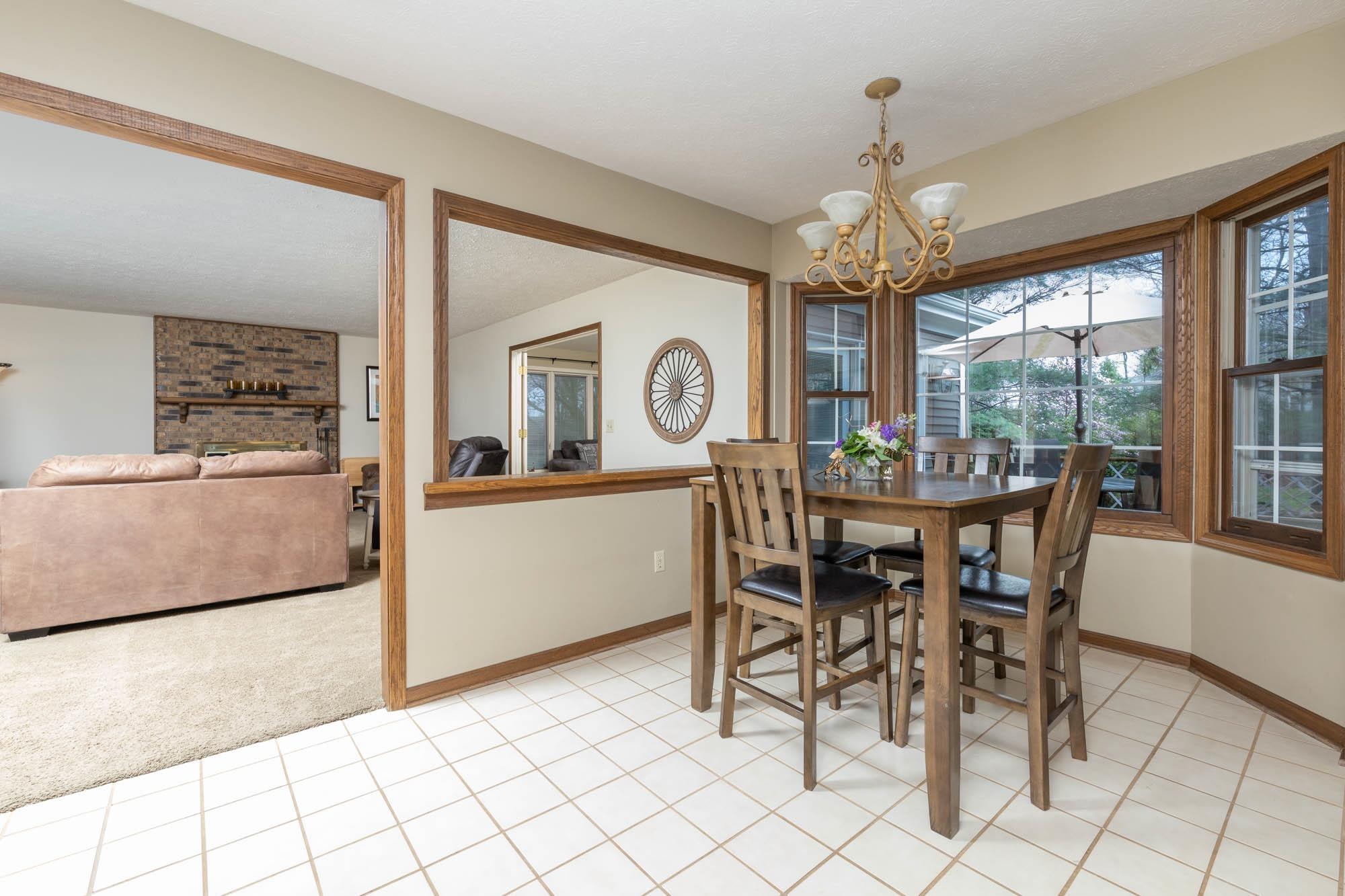 7113 Sentinel Road Rockford, IL 61107 - Photo 11 of 38 a view of a dining room with furniture window and outside view